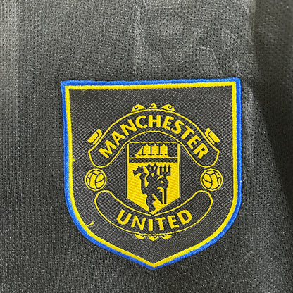 Kit Manchester United Terceiro Criança 2025/2026